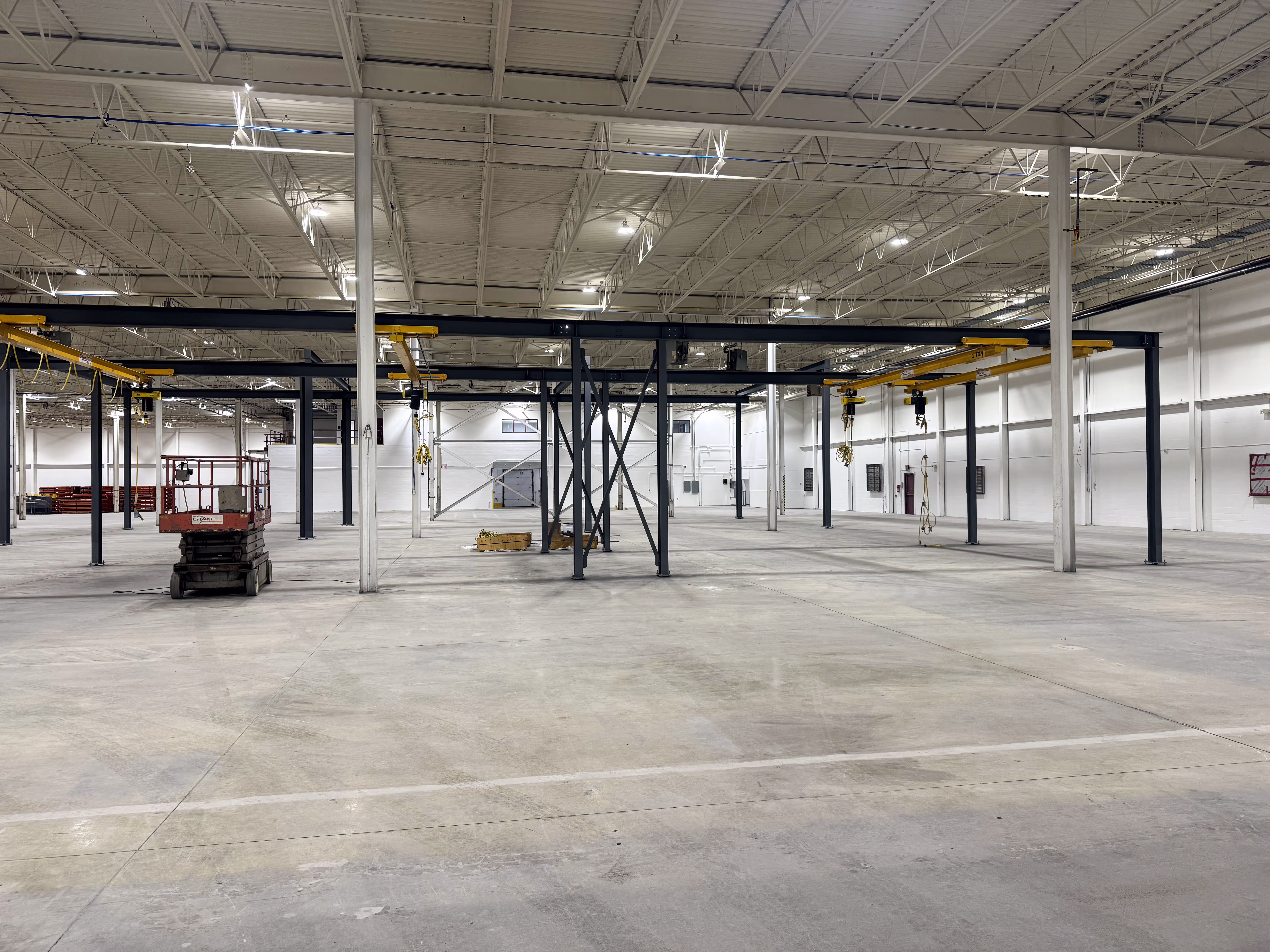 Completed Curtiss-Wright warehouse with structural steel and upgraded lighting